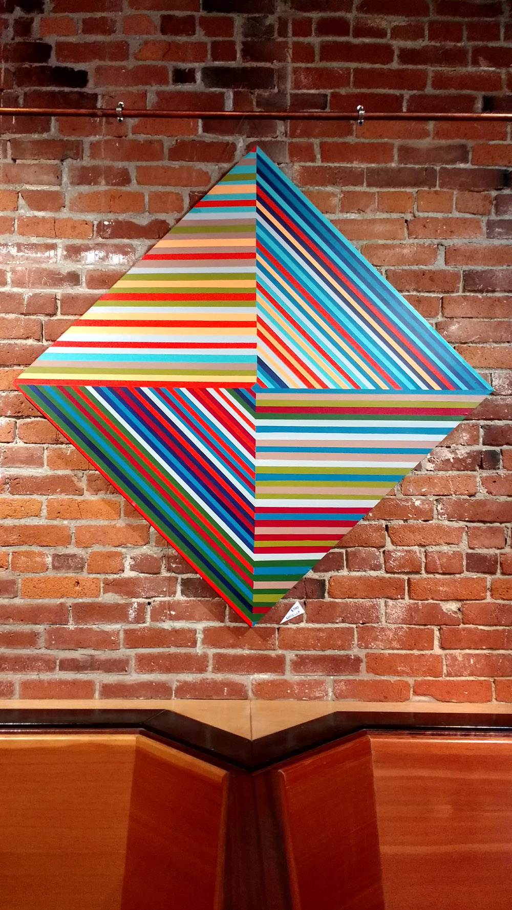 coloful op art hanging in gallery