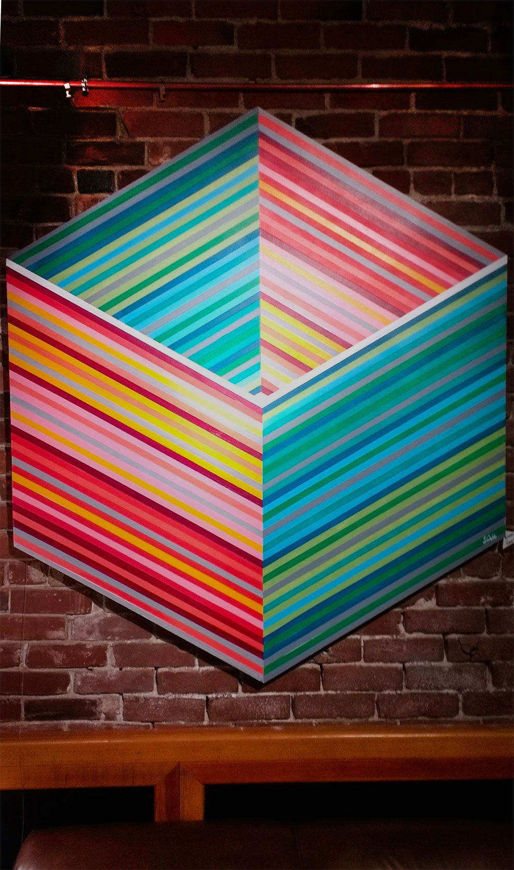 colorful op art hanging in gallery